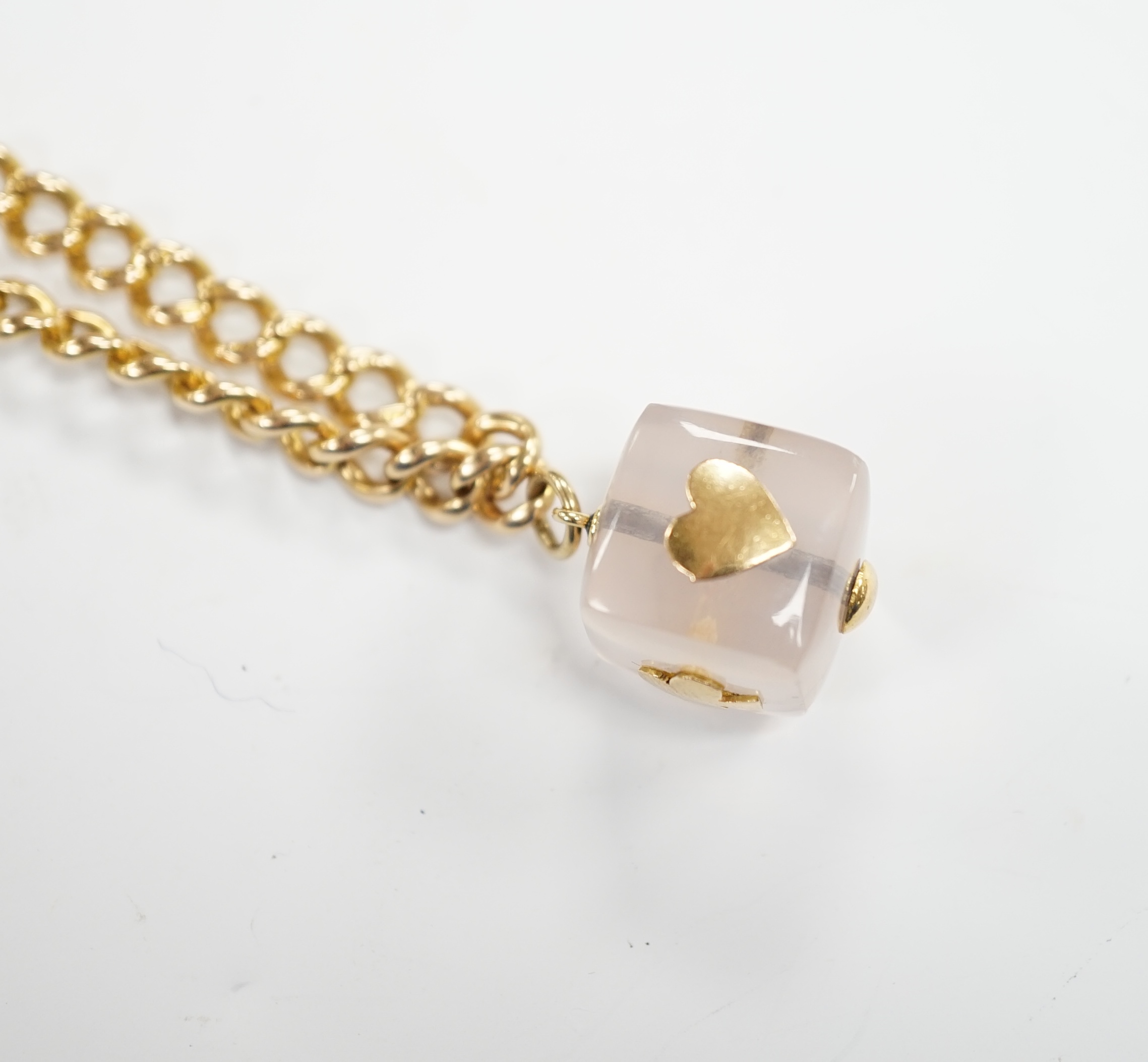 An Edwardian 15ct gold curb link bracelet, 16cm, hung with a later mounted glass cube charm, gross weight 20.8 grams.